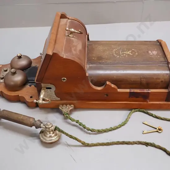 vintage Ericsson wood and metal cased wall telephone with key - some corrosion, cord is frayed H-690 W-380
