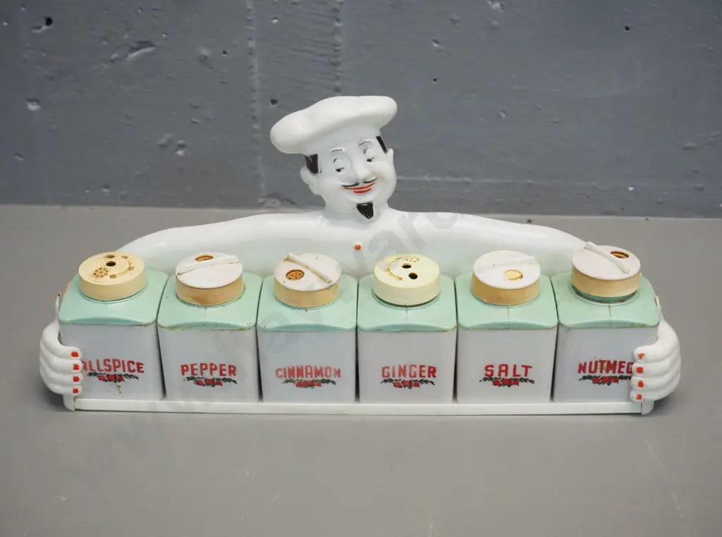 retro plastic rack with chef figure - some damaged or missing canister tops H-150 W-340 Image 1++