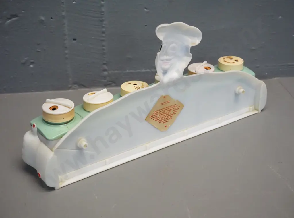 retro plastic rack with chef figure - some damaged or missing canister tops H-150 W-340 Image 1++