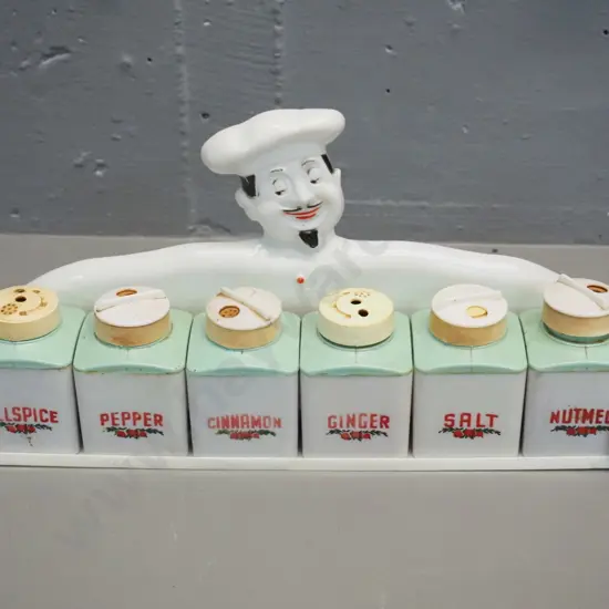 retro plastic rack with chef figure - some damaged or missing canister tops H-150 W-340