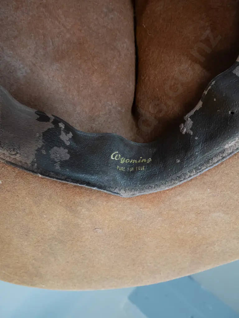 New Zealand army cap and brass buttons and a lemon squeezer felt hat with Wyoming - Pure Felt label Image 1++