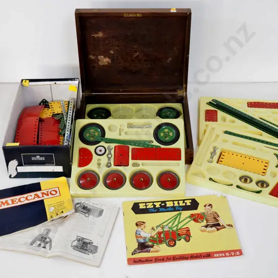 vintage Meccano and Ezy-Bilt construction toys and instruction booklets with non-original wooden case