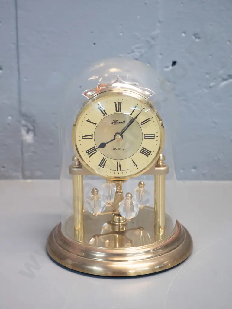Hermle German plastic and metal quartz movement anniversary clock with glass dome H-170 D-140 at base Image 1++