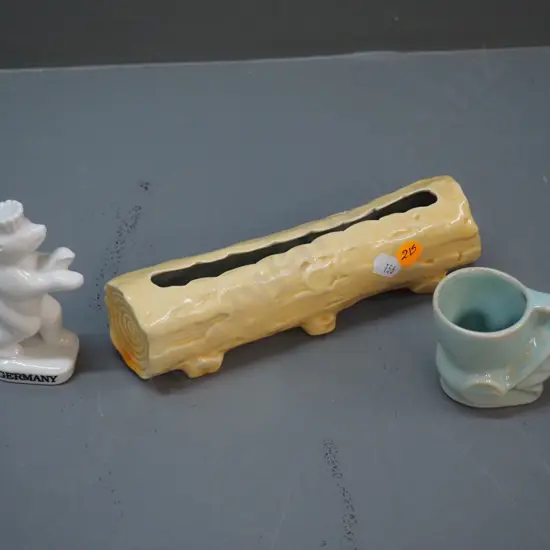 OC Stephens log vase L-190, Crown Lynn rabbit egg cup, and a Berlin bear figure