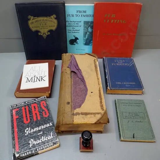 Mutual Furs Dunedin rubber stamp, a large ledger book with dates from 1936 thru 1960s, and assorted fur related books
