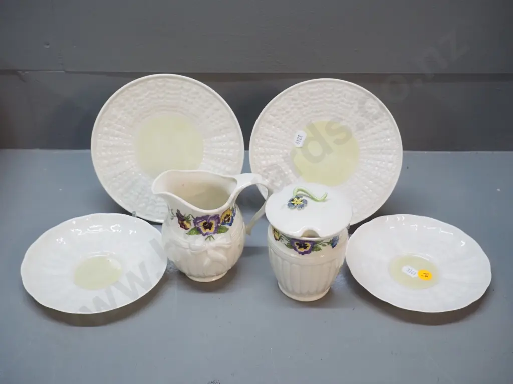 Belleek china items - pansy pattern cream and sugar and 4 green mark lustre items - 2 sides and 2 saucers, non matching Image 1++