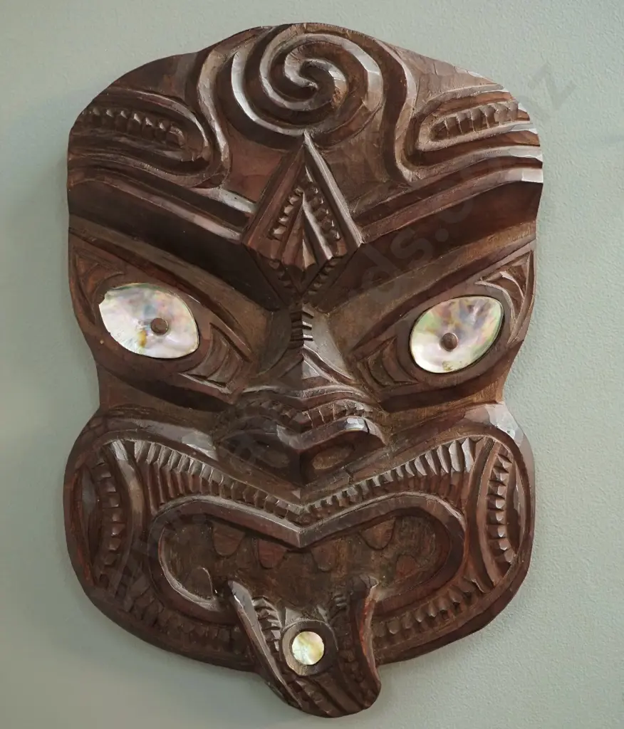 carved wooden wall-hanging tiki with paua shell insets H330 W230 Image 1++
